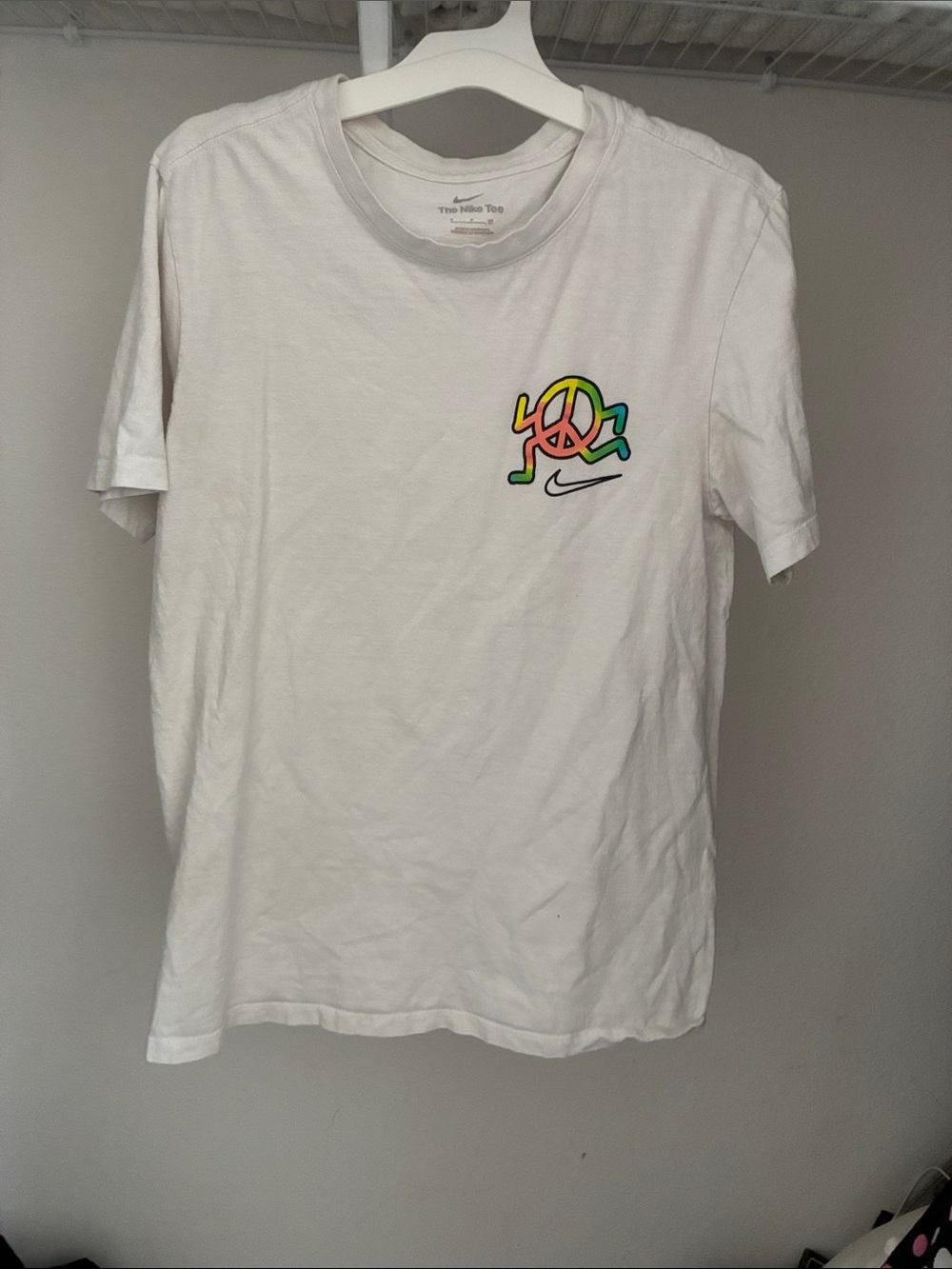 Nike White Tee with Rainbow Peace Graphic and Black Swoosh
